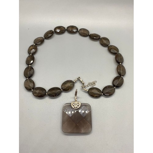 81 - smokey quartz necklace with silver fastenings