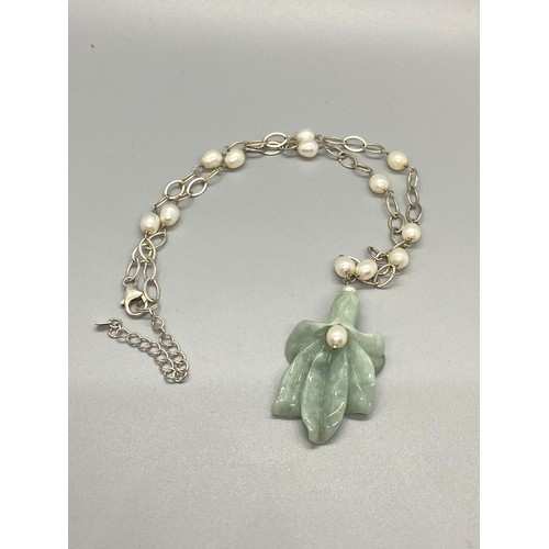 86 - silver and pearl chain with jade flower pendent