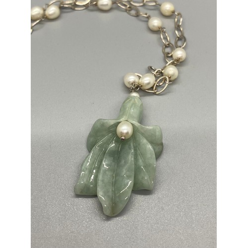 86 - silver and pearl chain with jade flower pendent