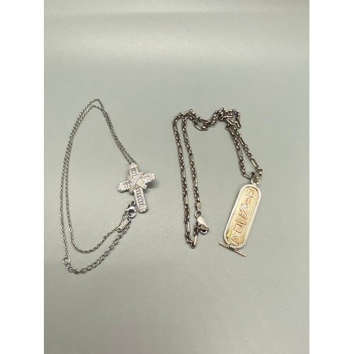 164 - silver chain with Egyptian pendent along with silver cross and chain