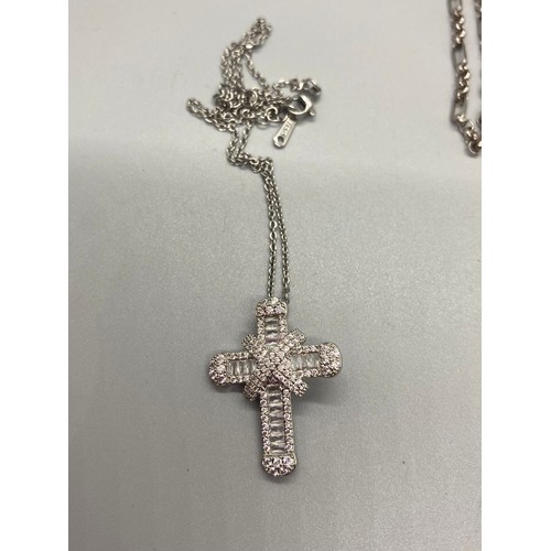 164 - silver chain with Egyptian pendent along with silver cross and chain