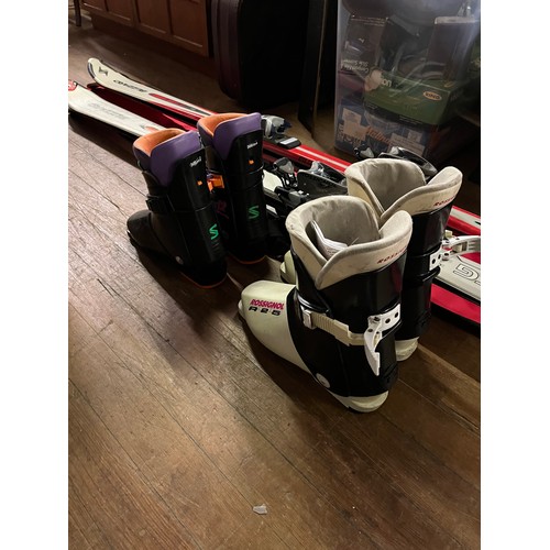 447 - 2 sets of skis and boots