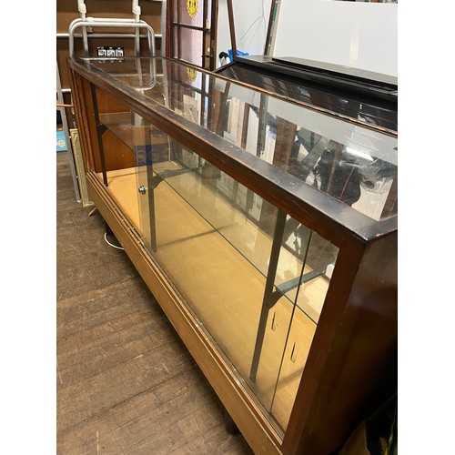 78 - Vintage haberdashery cabinet with sliding doors.