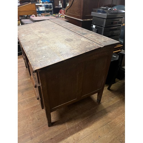 123 - Antique oak teacher/military desk with 6 drawers.