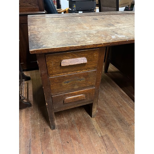 123 - Antique oak teacher/military desk with 6 drawers.