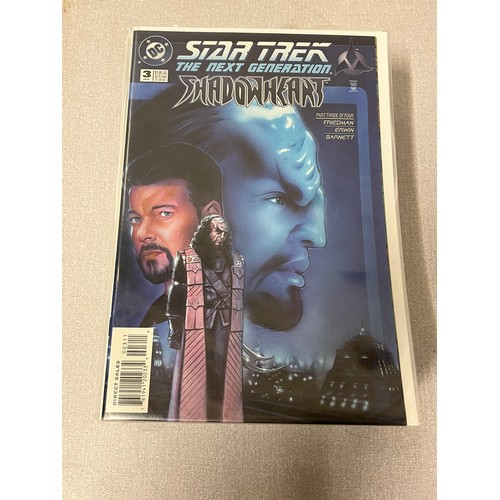 127 - 28 DC Star Trek comics in protective covers.