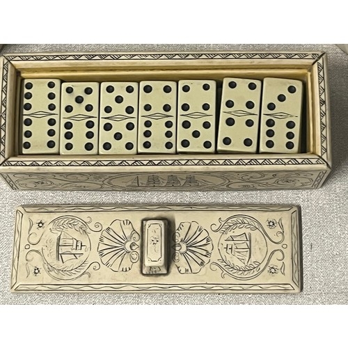 132 - Selection of scrimshaw style items to include dominoes set etc.