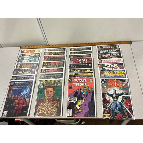 181 - 29 DC Star Trek Comics in protective covers.