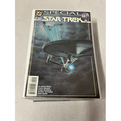 182 - 28 DC Star Trek comics in protective cover.