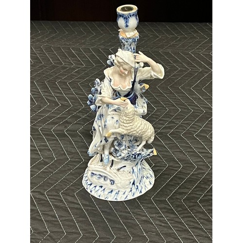 87 - 18th Century Meissen porcelain figural candlestick.
small pieces of damage
31cm h