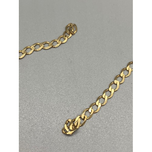 158 - 9ct gold curb chain (link broken)
4g
18