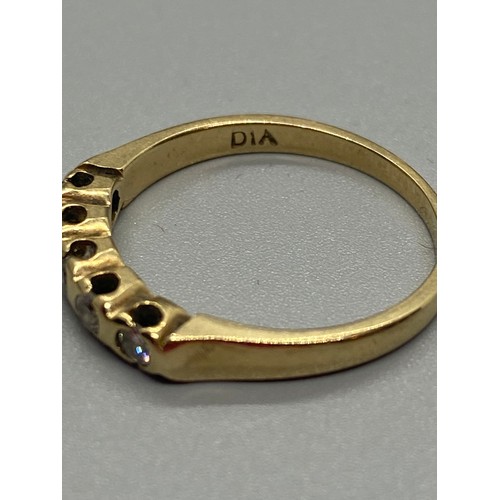 160 - 9ct gold & diamond band ring