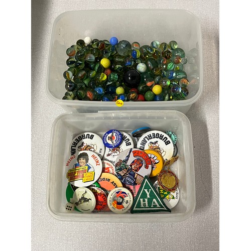 13 - 2 tubs of vintage marbles & badges