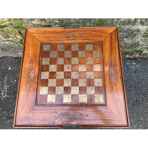 18 - A rosewood games table with reversible chess & backgammon top with queen anne legs
61cm x 61cm x 62c... 