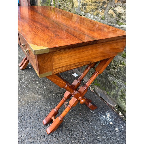 214 - A mid century rosewood highly polished inlaid campaign desk with 3 drawers to include matching chair... 