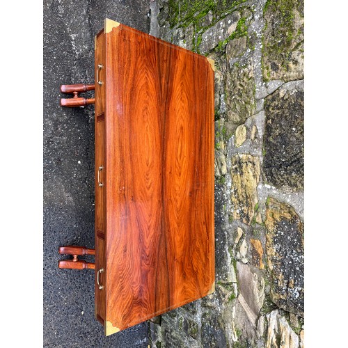 214 - A mid century rosewood highly polished inlaid campaign desk with 3 drawers to include matching chair... 