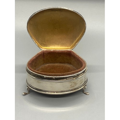 216 - S & Co Hallmarked silver jewellery/trinket box on legs with velvet lining. 56.25g