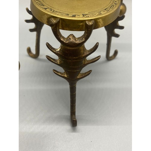 220 - Indian brass stand with balancing dancer along with small metal bird ornament.
tallest 14cm