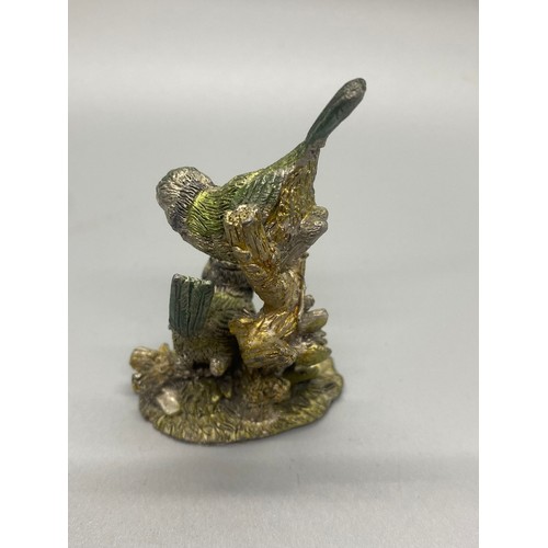 220 - Indian brass stand with balancing dancer along with small metal bird ornament.
tallest 14cm