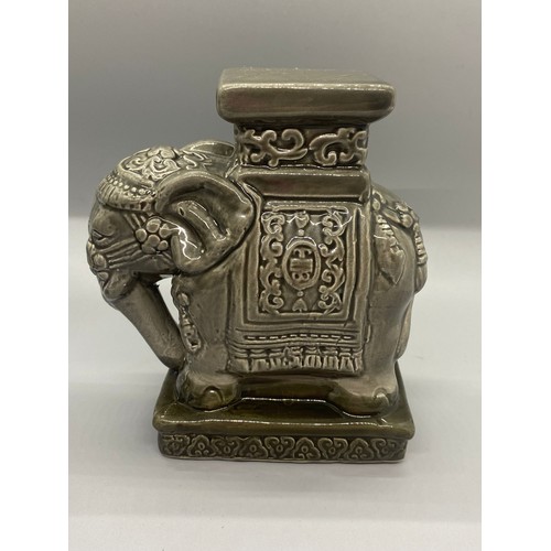 311 - Pair of small ceramic elephant plant stands.