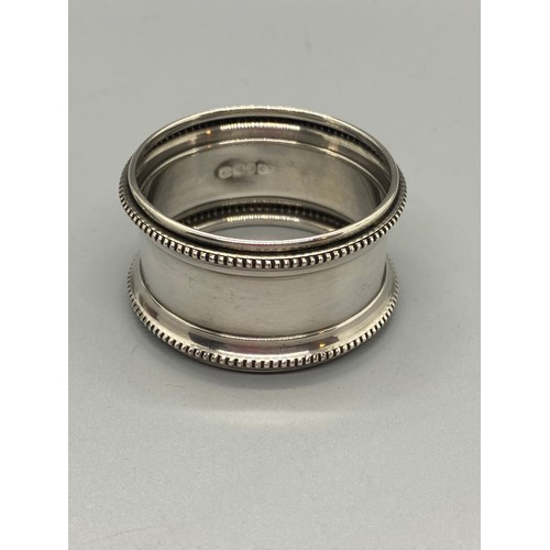 29 - 2 x hallmarked silver napkin rings. 14g