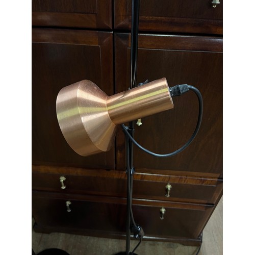 57 - Pair of retro floor standing spot lights with copper shades.