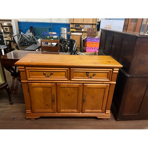 319 - Pine 3 door 2 drawer sideboard.