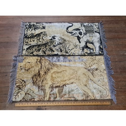 411 - 2 wall rugs depicting hunting scene and lion.