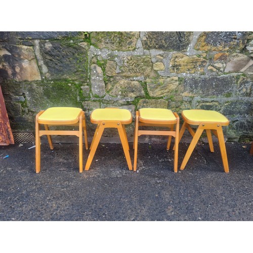 60 - 4 Mid Century stacking stools with lime green vinyl seat.