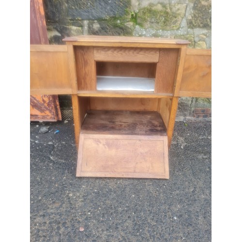 61 - Georgian oak nightstand with carving.