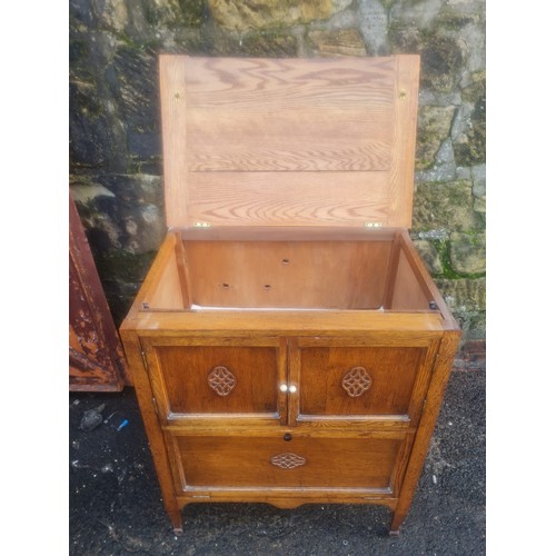 61 - Georgian oak nightstand with carving.