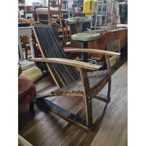 99 - Handmade Whisky barrel adirondack style rocking chair.