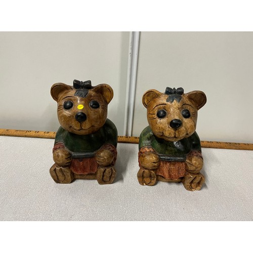 242 - Pair of wooden bear ornaments.