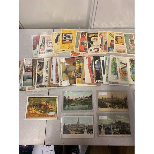 112 - Large collection of repro postcards.