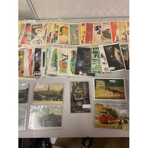 112 - Large collection of repro postcards.