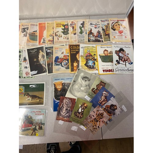 112 - Large collection of repro postcards.