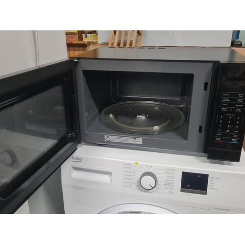 359 - Black Kenwood microwave.