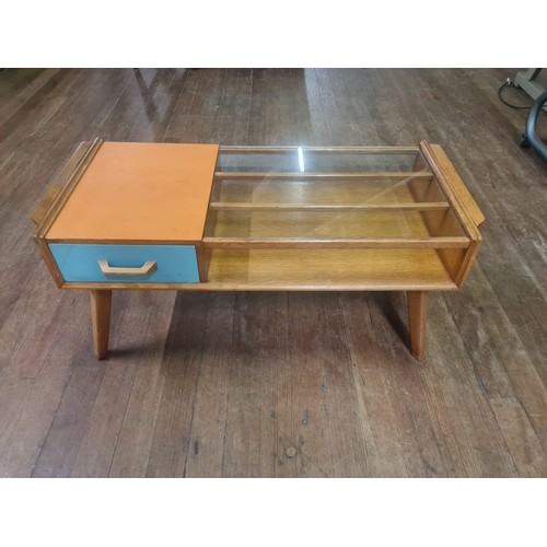 61 - A mid century G-plan E. Gomme Brandon glass topped teak coffee table, with pull through drawer, supp... 