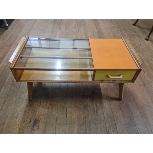 61 - A mid century G-plan E. Gomme Brandon glass topped teak coffee table, with pull through drawer, supp... 