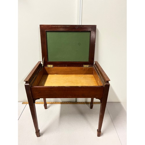 68 - Antique upholstered piano stool.