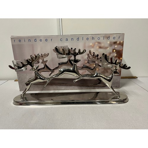 216 - Chrome metal reindeer candle holder
50cm l