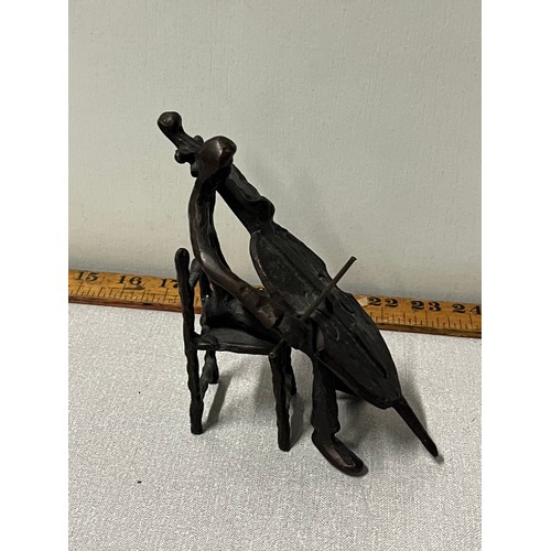 83 - Bronze stickman playing cello.
15cm h