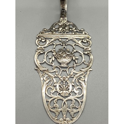 5 - Antique 800 silver cake server with floral design. 41g