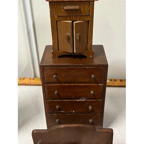 19 - Small collection of antique dolls house furniture to include chest of drawers etc. 
Tallest 19cm