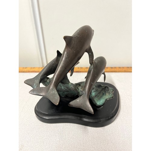 23 - Bronze 3 dolphin sculpture on base. 
15cm h