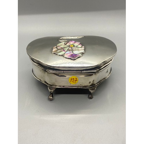 31 - Solid silver MB Hallmarked trinket box on four legs with mother of pearl flower design. 168g.