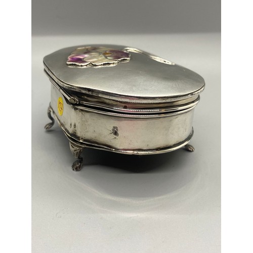 31 - Solid silver MB Hallmarked trinket box on four legs with mother of pearl flower design. 168g.