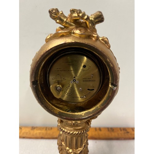 246 - Heavy brass gilt watch holder with Cyma sonomatic clock fitted.
20cm h