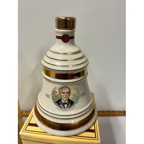 397 - 2 x 70cl boxed Bells scotch whisky decanters full & sealed to include Alexander Fleming & Lucky 13.