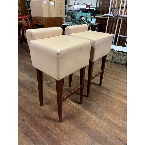 493 - Pair of cream leather/vinyl stools.